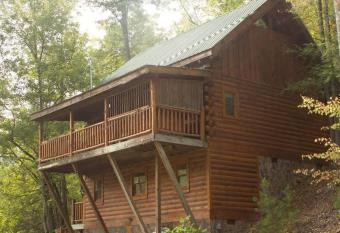 ChocolateBearRealLogCabinWhirlpoolArcadePetsOK has Balcony rooms