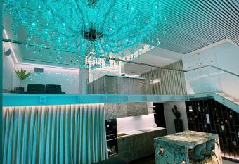 Luxury Queen V apartment with Jacuzzi has rooms with a private hot tub