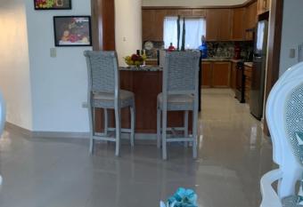 Luxury Ocean View with jacuzzi and Rooftop views in Puerto Plata just 5 minutes from the beach and 10 minutes from city central. has rooms with a private hot tub