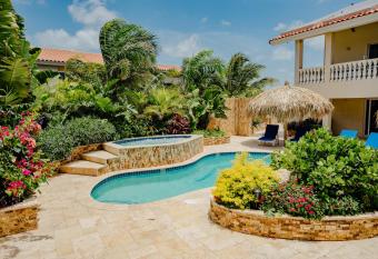 Wonderful modern 2-bedroom apartment with tropical garden, pool and jacuzzi has Balcony rooms