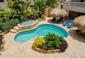 Stunning modern 2-bedroom apartment with tropical garden, pool and jacuzzi has Balcony rooms