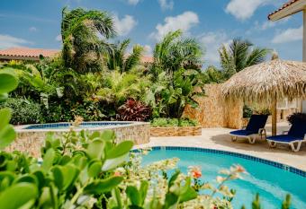 Fabulous modern 2-bedroom apartment with tropical garden, pool and jacuzzi has Balcony rooms