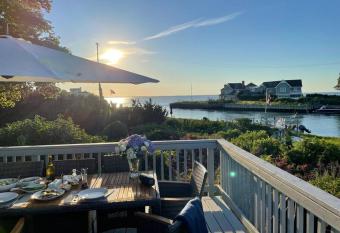 Waterfront Hamptons house, private beach, 30ft boat dock and nearby Golf Courses has Balcony rooms