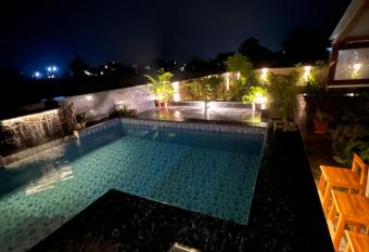 Param Country Home has Balcony rooms