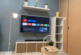 1 BR Cozy Modern-Style Condo with Balcony & 5-star amenities at Wind Residences allows 18 year olds to book a room