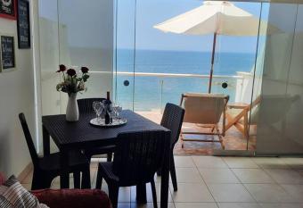 Hermoso departamento con terraza frente al mar has Balcony rooms