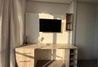 Cozy 2 bedroom apartment at Sandton Skye has rooms with a private hot tub