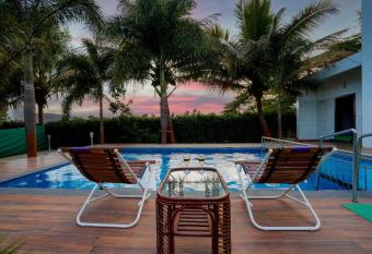 White Coco House 4BHK has Balcony rooms