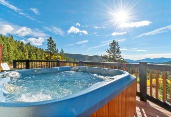 St Mary's Glacier Retreat w Hot Tub & Views allows 18 year olds to book a room