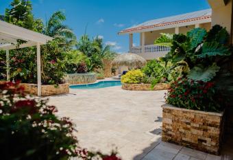 Modern 2-bedroom apartment with tropical garden, pool and jacuzzi has Balcony rooms