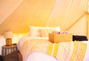 Glamping Valle de Guadalupe with Private Bathrooms by YUMA Resort allows 18 year olds to book a room