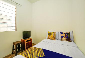 SPOT ON 91615 Arumba Guest House Syariah allows 18 year olds to book a room