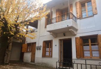 THEO TRADITIONAL HOUSE has Balcony rooms