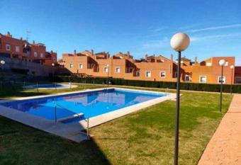 Casa adosada 3 habitaciones con piscina comunitaria has Balcony rooms