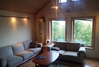 Spacious Family Friendly one-level apartment with a Cozy Loft and big Garden has rooms with a private hot tub