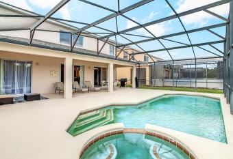 8BR Resort Home Pvt Pool BBQ has rooms with a private hot tub