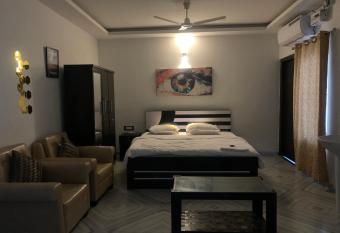 A.J. Studio Apartment has Balcony rooms