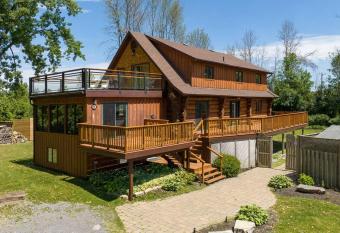 Unique Log House by the Lake, Retreat with Spa Amenities near Presque'ile Provincial Park has Balcony rooms