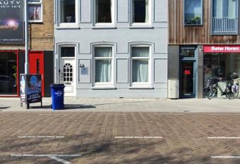 Bed & Breakfast House of Grace achterkamer met patio allows 18 year olds to book a room