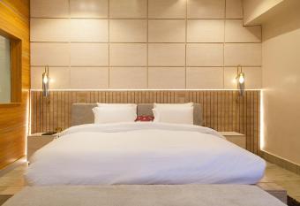 AZURE HOTEL AND SUITES allows 18 year olds to book a room