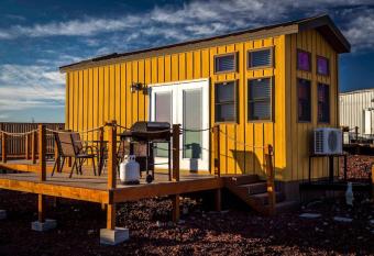 Desert Oasis Tiny Home has rooms with a private hot tub