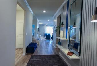 Modern villa with an arcade, theater, pool and spa that the family will love has rooms with a private hot tub