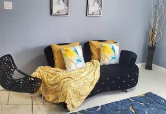 ComfortSuite 2 BD near Stadium & Bob Marley Studio has Balcony rooms