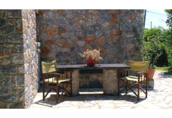 Stone house among trees has Smoking/Balcony rooms