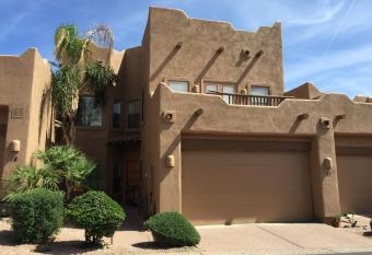 2 private master suites and loft with kitchenette in upper level within our shared townhome has rooms with a private hot tub