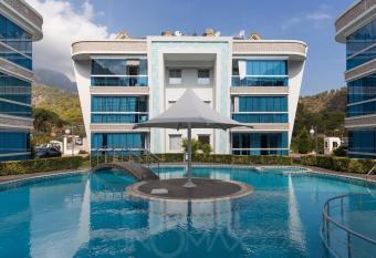 Han-De Homes 1 (1+1 70m2)Full e  yal  ,havuzlu,otopark, denize 2km has Balcony rooms