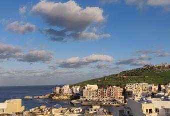Minute walk to the sea has Balcony rooms