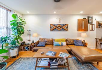 Bedroom in thoughtfully decorated East Passyunk home (South Philadelphia) has Balcony rooms