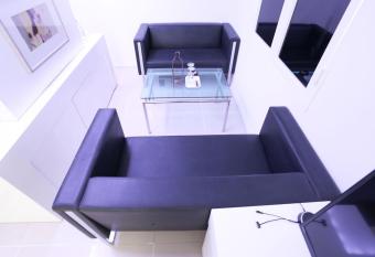 Q Hotel has rooms with a private hot tub