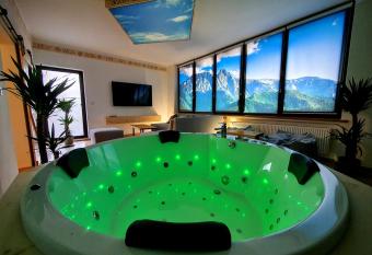 Apartament z jacuzzi Zakopane has rooms with a private hot tub