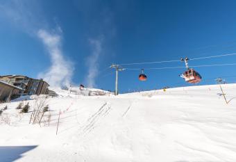 Ski in Ski Out Slopeside Luxury Townhome at Apex Residences with Private Hot Tub has rooms with a private hot tub