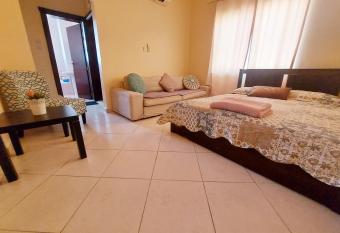 DO ALL BY WALKING DISTANCE IN ALAIN allows 18 year olds to book a room