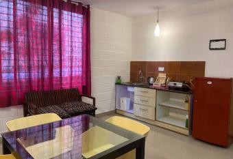 Brown cozy nook-classy 1 BHK in the heart of Mysuru allows 18 year olds to book a room