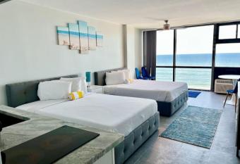 Oceanside Beachfront Condo allows 18 year olds to book a room