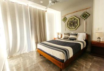 Dune Luxury Condos - Suite w Private Terrace has rooms with a private hot tub