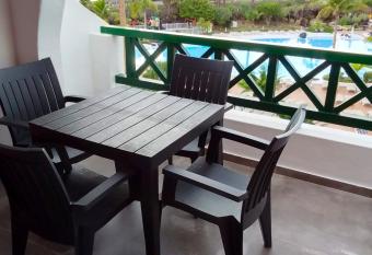 2 bedrooms appartement at Playa de la Americas 300 m away from the beach with sea view shared pool and furnished terracea has Balcony rooms
