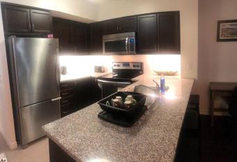 1 bedroom condo beside CN Tower & Rogers Centre has rooms with a private hot tub