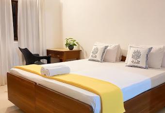 Simple & Sober 3BR Apartment, 500 meters from Candolim Beach has Balcony rooms