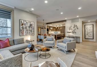 Premium Three Bedroom Suite apartment hotel has rooms with a private hot tub