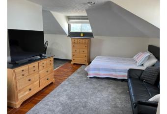 Grand Old White Garage Loft allows 18 year olds to book a room