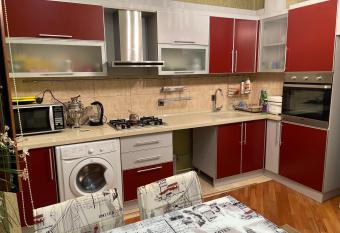 Turan Apartment has rooms with a private hot tub