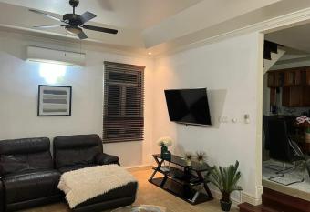 3 bedroom townhouse with your own pool at the back has rooms with a private hot tub