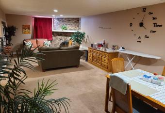 Cozy home with comfortable beds and fully equipped kitchen 15 mins drive from airport, downtown, SAIT and U of C and 80 min drive to Banff allows 18 year olds to book a room