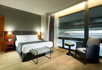 Exe Isla Cartuja allows 18 year olds to book a room