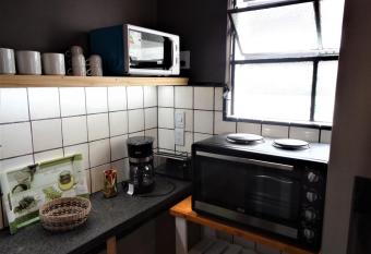 Maison Depla with rooftop, Jacuzzi, pool, GYM and BBQ has rooms with a private hot tub