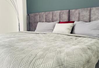 Firstclass Event & Hotel has rooms with a private hot tub